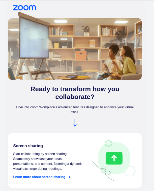 Two people collaborating in an office while viewing a digital whiteboard, promoting Zoom Workplace features like screen sharing for enhanced virtual collaboration.